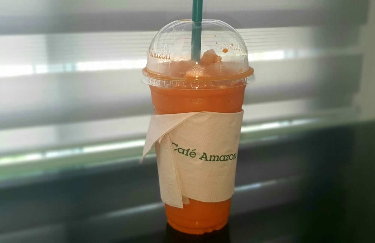 Thai Tea From Cafe Amazon Placed On A Table